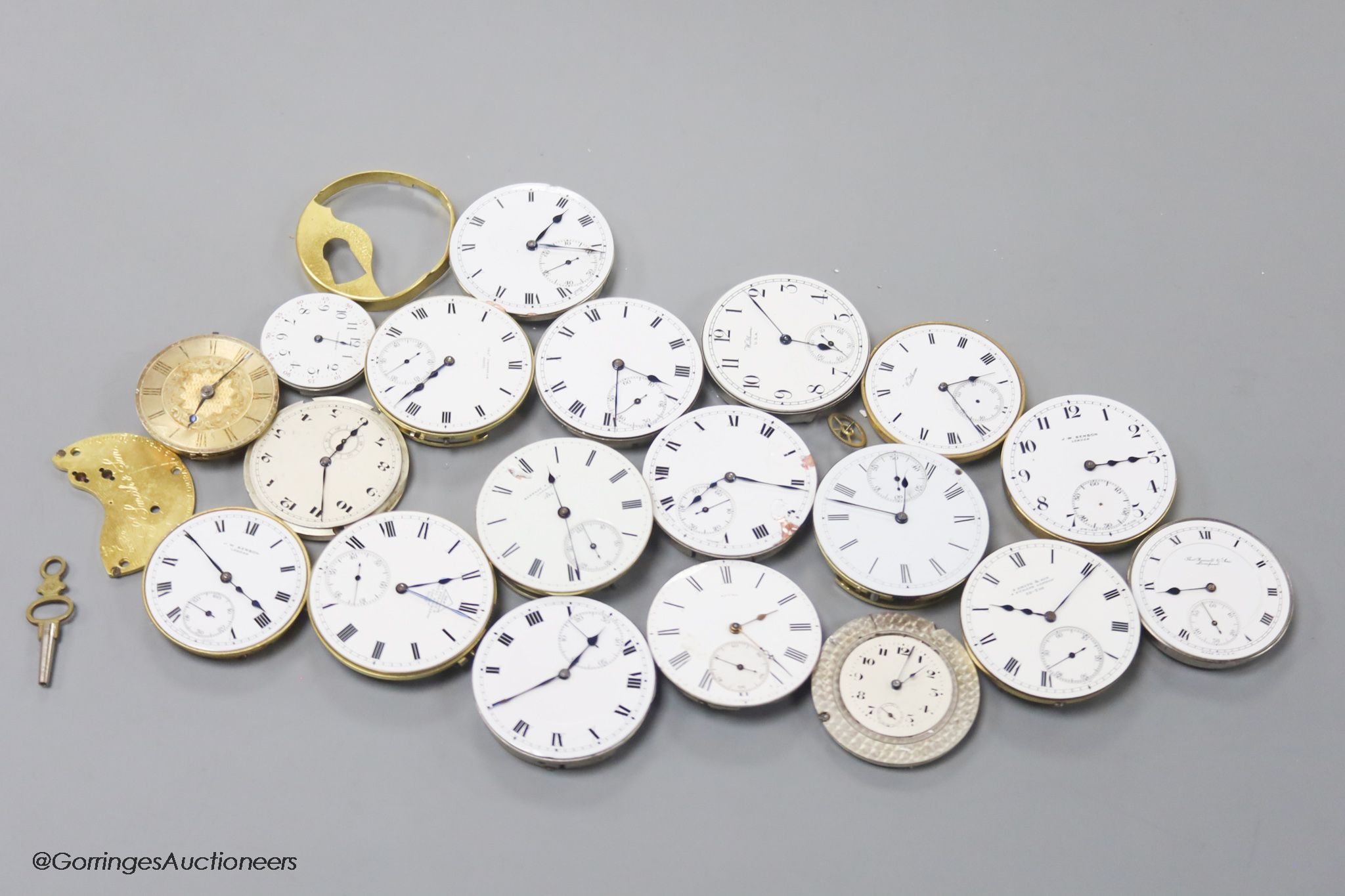 A small collection of assorted pocket watch movements, including Waltham & Tavannes.